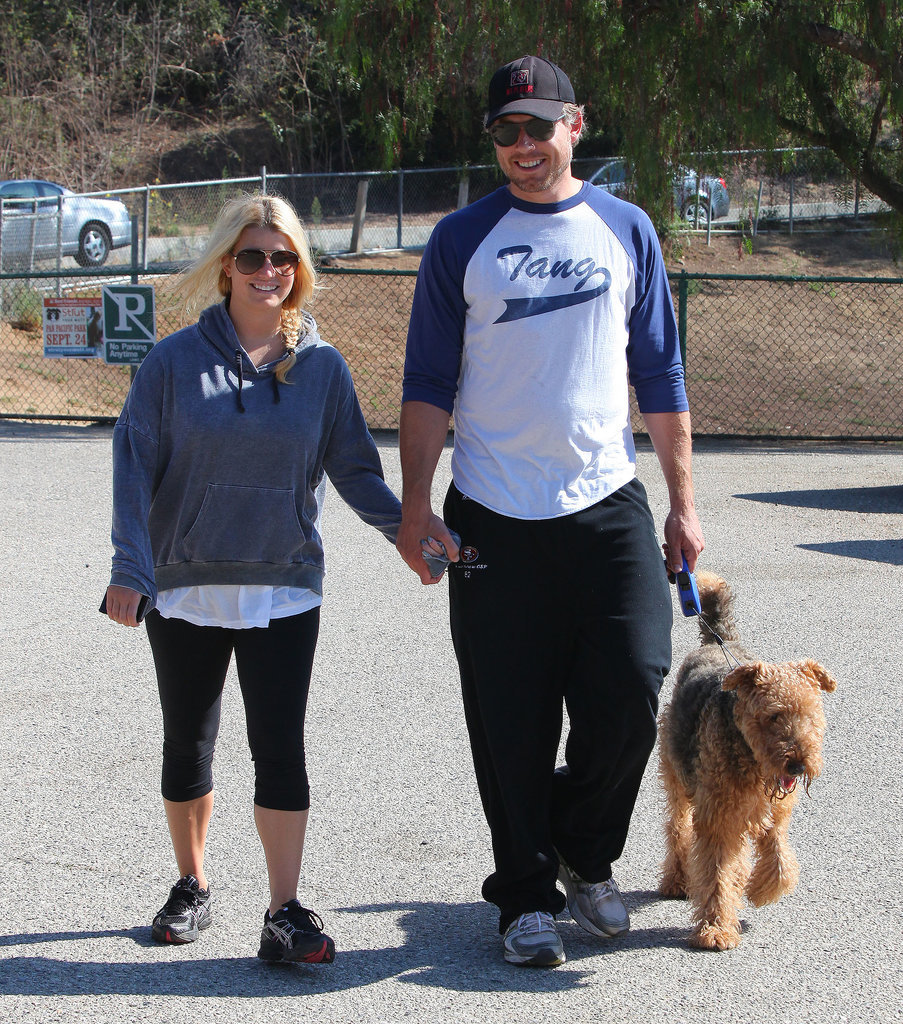 The couple held hands while walking their dog in LA in September 2011.
The couple held hands while walking their dog in LA in September 2011.