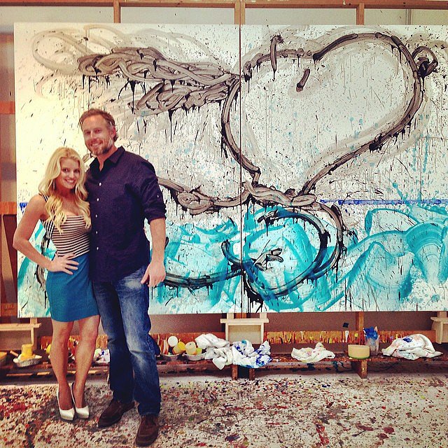 Eric and Jessica posed together in front of their new art piece on their four-year anniversary in May 2014.
Source: Instagram user jessicasimpson
Eric and Jessica posed together in front of their new art piece on their four-year anniversary in May 2014.
Source: Instagram user jessicasimpson