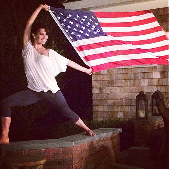 Hilaria Baldwin showed off her yoga skills with a giant flag.
Source: Instagram user hilariabaldwin
Hilaria Baldwin showed off her yoga skills with a giant flag.
Source: Instagram user hilariabaldwin