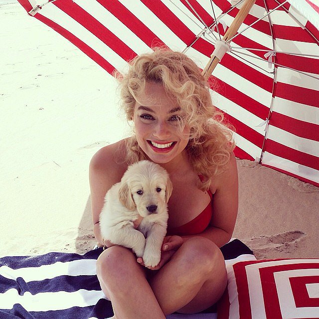 Margot Robbie thought about stealing a puppy in this throwback photo. Source: Instagram user margotrobbie 
