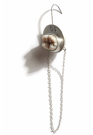 Jewelry Made Out of . . . Human Teeth and Hair! 
