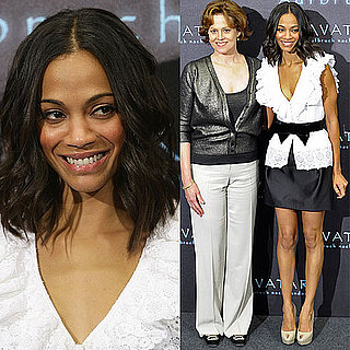 Zoe Saldana Wears White Ruffle Blouse and Bow Belt at Avatar Photo Call in Germany