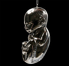 Silver Fetus Ornament from The Flaming Lips