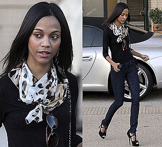 Photos of Zoe Saldana Shopping in Beverly Hills Wearing Black Shirt, Blue Jeans, and Chanel Bag