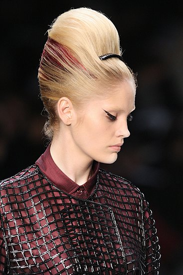 Makeup: YSL did "Fellini eyes" but it wasn't the only time we saw dramatic liner on catwalk lids. 