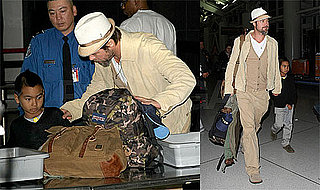 Photos of Brad Pitt and Maddox Jolie-Pitt at JFK Airport, Dave and Buster's in NYC