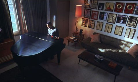 Jamie Foxx's brilliant portrayal of the musician Ray Charles in the biopic Ray tells a classic American story of determination, talent, and redemption. Ray's wall of concert posters and awards attest to his success. Source
Jamie Foxx's brilliant portrayal of the musician Ray Charles in the biopic Ray tells a classic American story of determination, talent, and redemption. Ray's wall of concert posters and awards attest to his success. Source