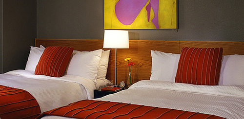 Found It! Vibrant Orange Bedspread at Seattle's Hotel Max