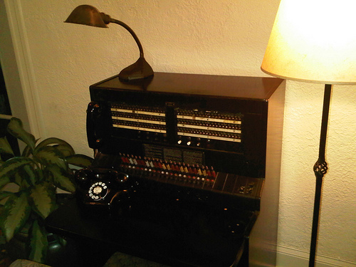 Go for an entirely retro look with a rotary phone and a switchboard, like this one in the lobby of the Cardinal Hotel in Palo Alto, CA.
Source: Flickr User Ethan Prater
Go for an entirely retro look with a rotary phone and a switchboard, like this one in the lobby of the Cardinal Hotel in Palo Alto, CA.
Source: Flickr User Ethan Prater