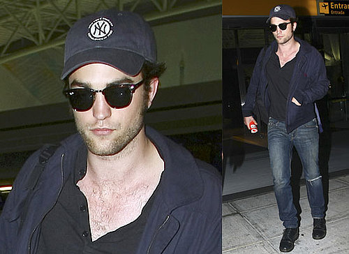 Photos of Robert Pattinson at JFK, as Twilight Google Launches and Shakira Says She'd Like to Collaborate With Robert