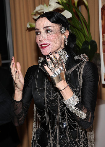 Daphne Guinness Trades in Skunk-Striped Hair for All Black, Swims in Pool Clothed for Art Basel Performance Piece Daphne Guinness Trades in Skunk-Striped Hair for All Black, Swims in Pool Clothed for Art Basel Performance Piece