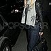 Heading to her car in wide-leg jeans in October