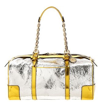 Guess Who Designed This Bold Metallic Duffle? Guess Who Designed This Bold Metallic Duffle?