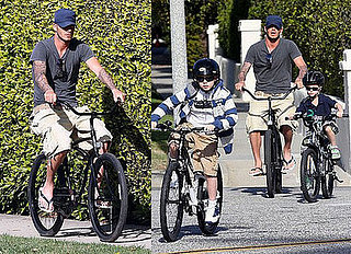 David Beckham Rides A Bike With Romeo Beckham and Brooklyn Beckham