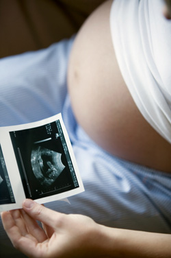 Burdened by Brag Books, Sonogram and Pint-Sized Pics?