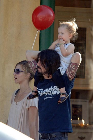 Dave Grohl strolled down the streets of Studio City with his wife Jordyn Blum and daughter Violet Maye. Dave Grohl strolled down the streets of Studio City with his wife Jordyn Blum and daughter Violet Maye.