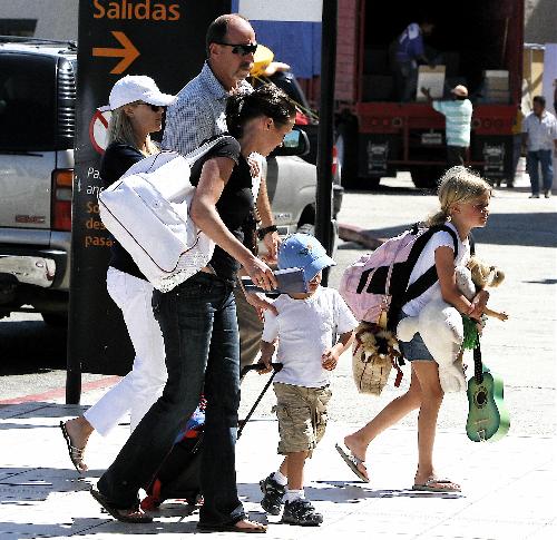 Reese and her crew at LAX after a Spring Break vacation with beau Jake. Reese and her crew at LAX after a Spring Break vacation with beau Jake.
