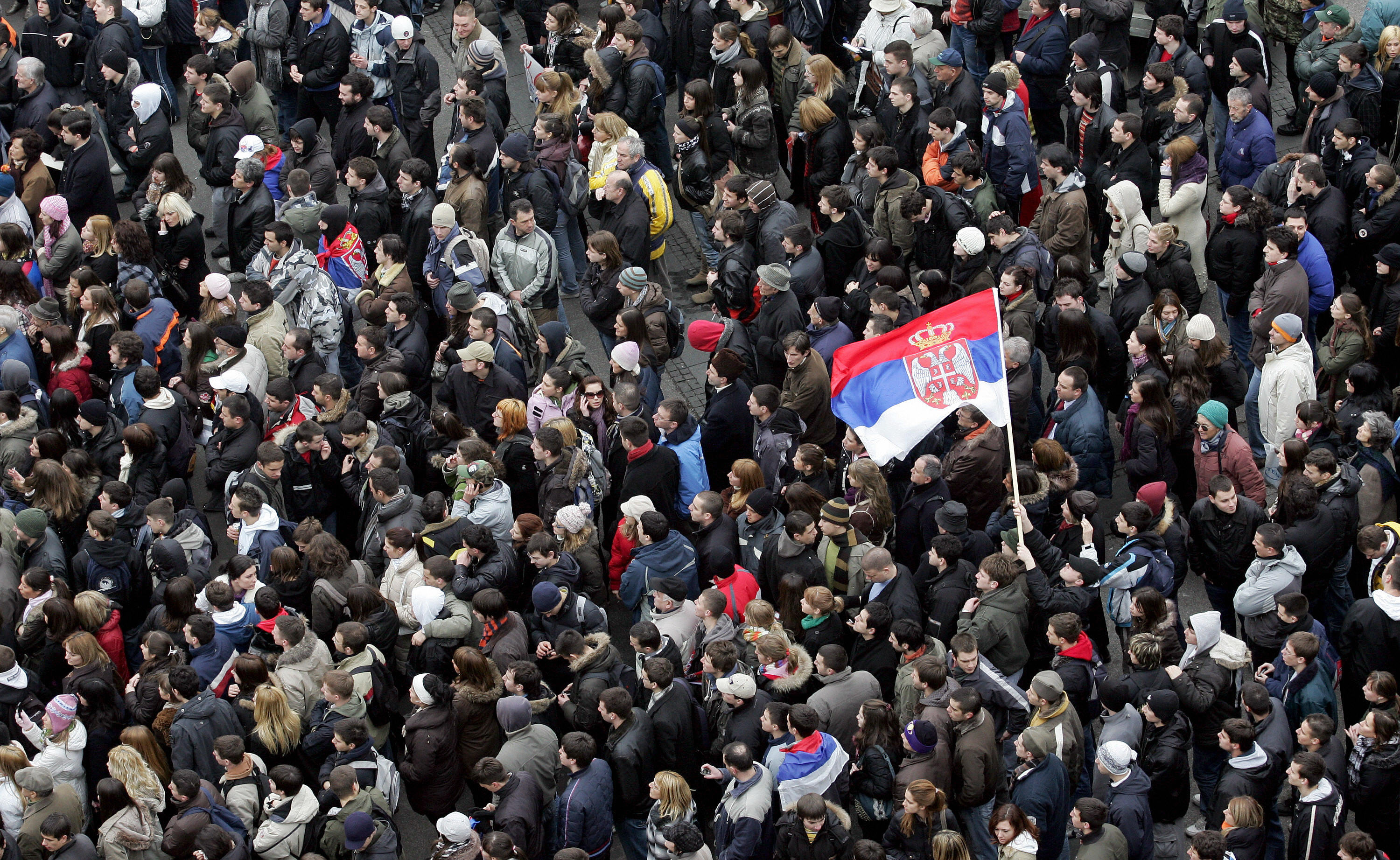 Serbian students wave flags during a peaceful protest in downtown Belgrade on February 18, 2008. Serbian students wave flags during a peaceful protest in downtown Belgrade on February 18, 2008.