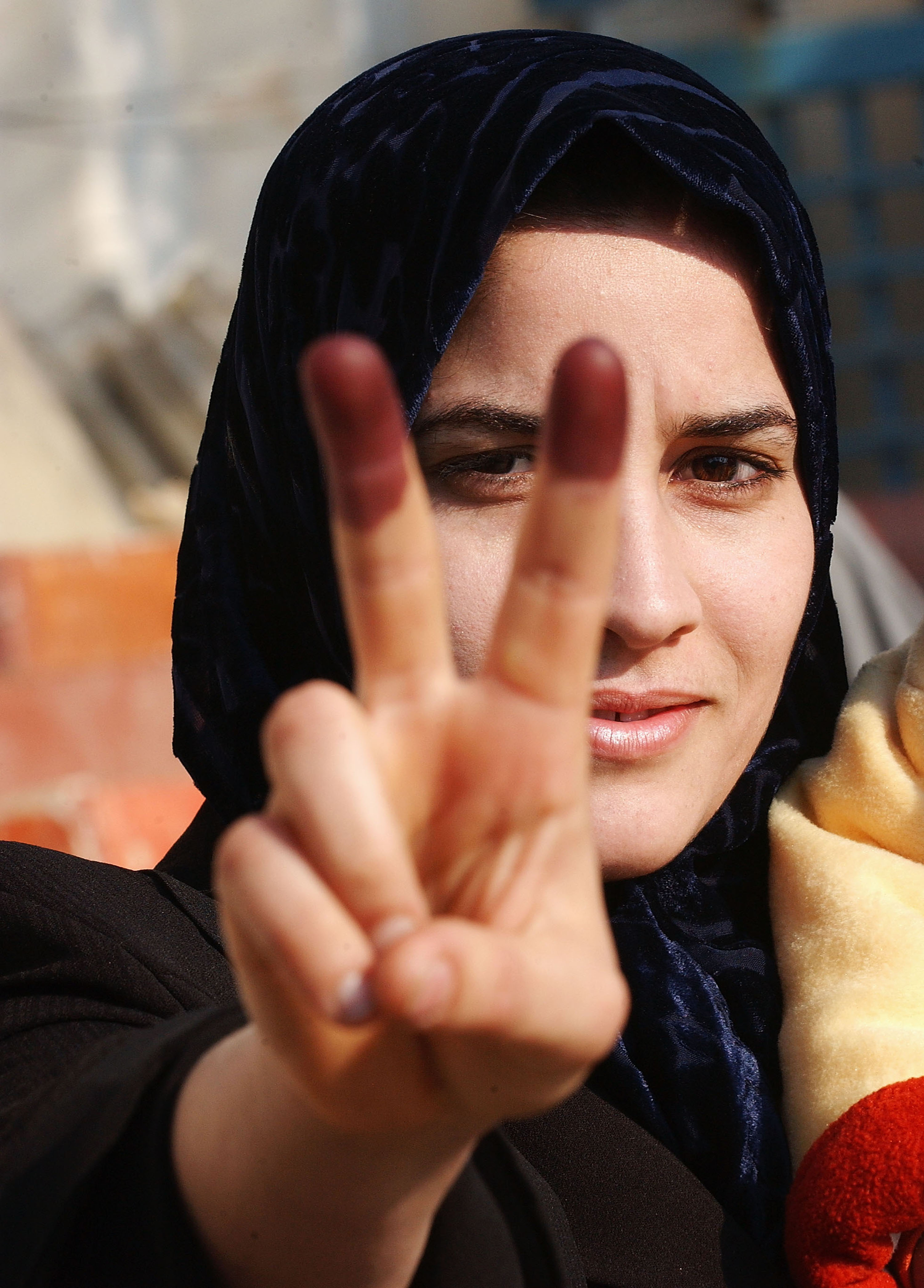 An Iraqi woman displays her inked fingers after voting on December 15, 2005. An Iraqi woman displays her inked fingers after voting on December 15, 2005.