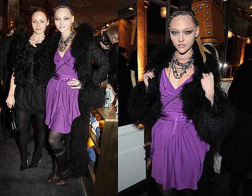 Model Sasha Pivarova Attends The Parisian Stella McCartney Store Opening in Purple Wrap Dress