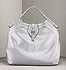 Guess Who Designed This Shiny St. Tropez Tote? 