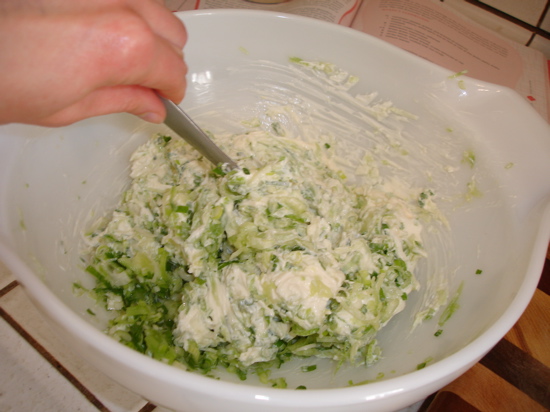Mixing the cheese Mixing the cheese