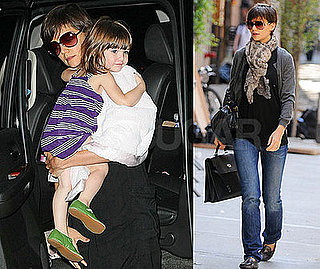 Katie Has Her Hands Full of Suri and Designer Bags 