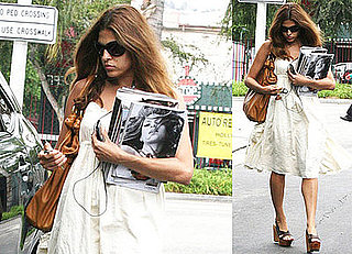 Eva Mendes Keeps Her Obsession in Her Arms