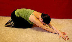 Stretch It: Crossing Child's Pose Stretch It: Crossing Child's Pose
