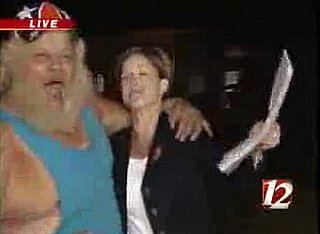 Boogie Woogie Man Wrestler Kisses Reporter on Live Television