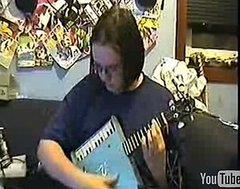 Guy Plays "Final Countdown" on Kazoo and Ukulele Instrument Guy Plays "Final Countdown" on Kazoo and Ukulele Instrument