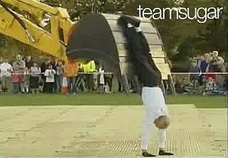 Man Dances With Bulldozer