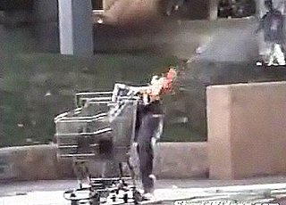 Torso-less Robot Legs Push A Shopping Cart Down the Street