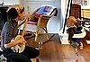 Baby Bounces While Mom Plays the Banjo