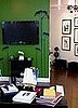 Photographer Lauren Hillary Uses Her Mounted Flat Screen TV To Complement Decor