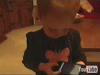 A 2-Year-Old Girl Shows How to Use an iPhone