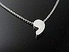 Pause Perfection: The Comma Pendant Necklace