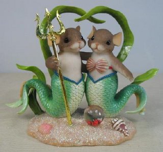I'll deal with your love of mice, and love of mermaids. But mermice? What exactly does a mermice cake topper tell your guests?
I'll deal with your love of mice, and love of mermaids. But mermice? What exactly does a mermice cake topper tell your guests?