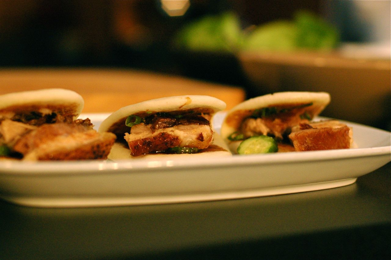 Chang served the dishes he made during the demo, pork buns and spicy lettuce wraps, at the party. Chang served the dishes he made during the demo, pork buns and spicy lettuce wraps, at the party.