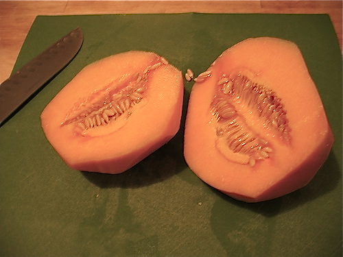 The cantaloupe's interior will be filled with messy seeds.
The cantaloupe's interior will be filled with messy seeds.