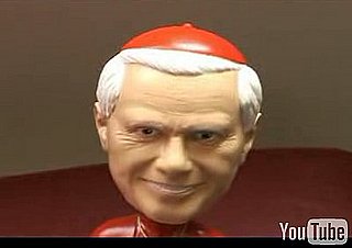 Pope Bobblehead Rides Public Transportation