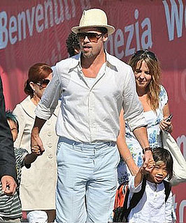 Brad Pitt Turns Photog; Who Snaps the Shots in Your Fam?