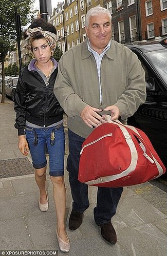 'Amy's covered in nicotine patches and eating like a horse,' reveals Winehouse's father