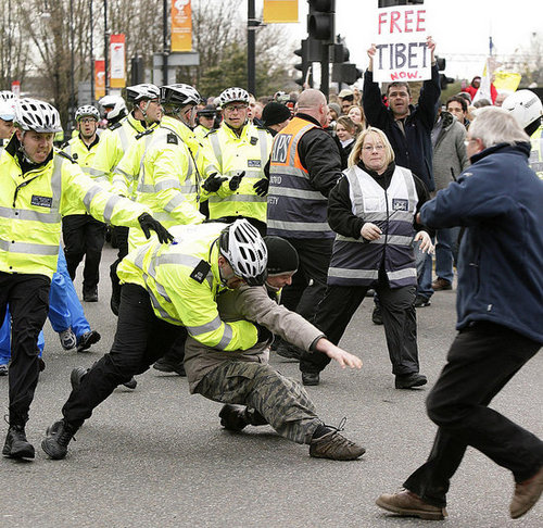Protesters Disrupt Olympic Torch Ceremony in London