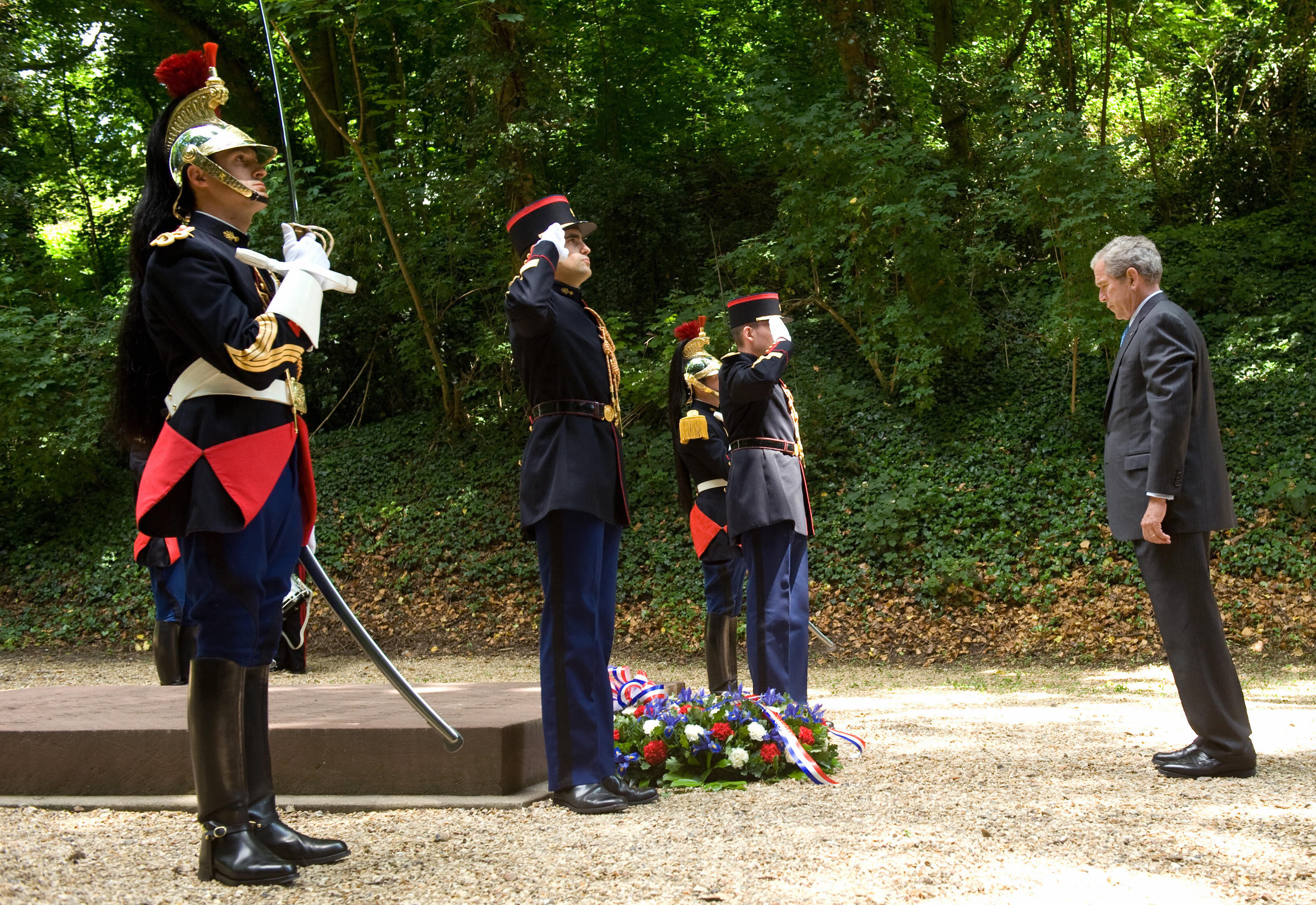 Bush pauses at a memorial to the French Resistance after laying a wreath. Vive la resistance! Bush pauses at a memorial to the French Resistance after laying a wreath. Vive la resistance!
