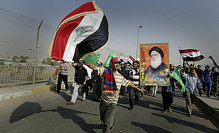 Front Page: Thousands Gather in Baghdad to Protest US Pact 