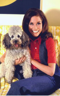 Ever the animal lover, Mary poses with her dog at home in 1970. Ever the animal lover, Mary poses with her dog at home in 1970.