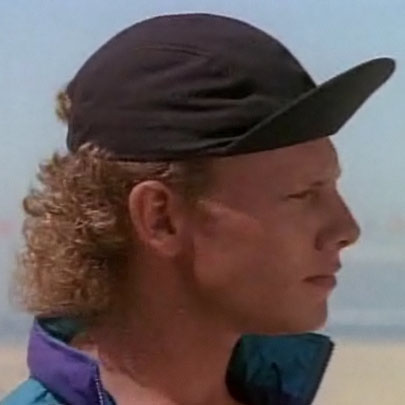 Steve shows off his curly mullet.
Steve shows off his curly mullet.