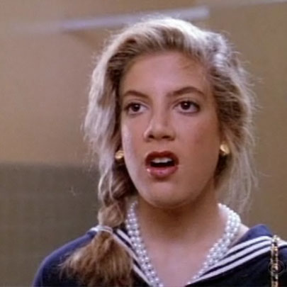 Donna, sporting a side braid, is horrified to discover that she has put both contacts in one eye.
Donna, sporting a side braid, is horrified to discover that she has put both contacts in one eye.