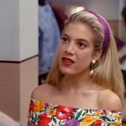 Donna, normally a fan of scrunchies, opted for a more tasteful purple headband in this scene.
Donna, normally a fan of scrunchies, opted for a more tasteful purple headband in this scene.